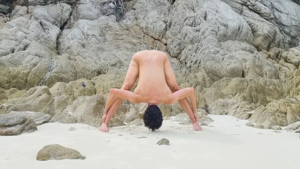 Standing Wide-Legged Forward Bend Pose - Naked Yoga