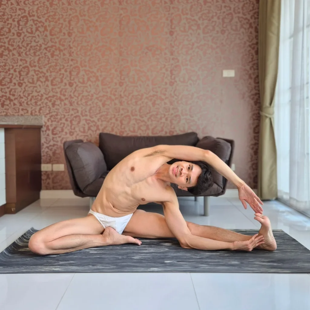 Revolved-Head-to-Knee Pose - Yoga for Gay Men